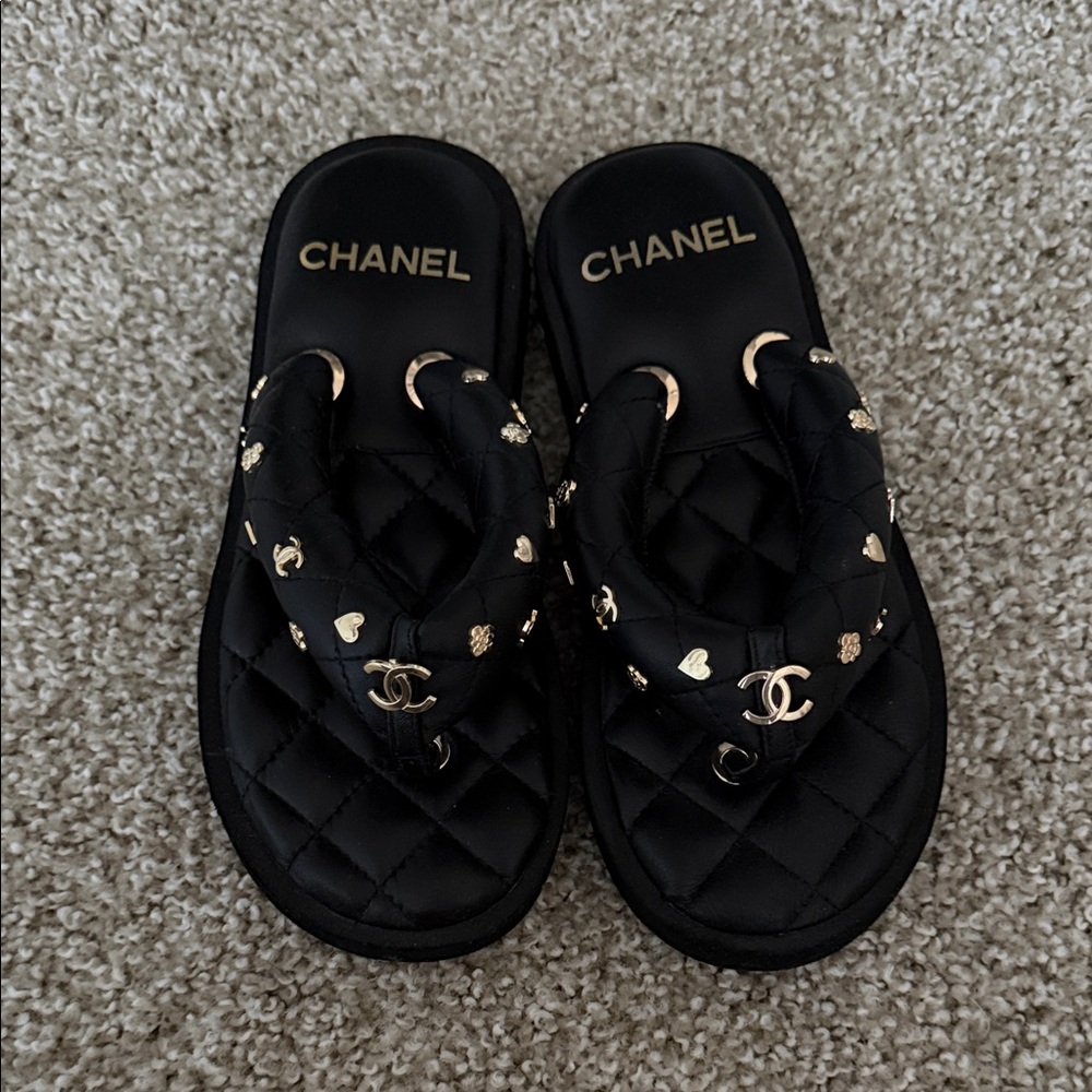 CHANEL Black Quilted Logo Thong Sandals with Gold Accents
